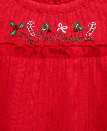 Girly first Christmas outfit set complete with a top, leggings and a matching bow. Candy cane themed